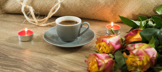 Fresh italian style coffee next to flower bouquet