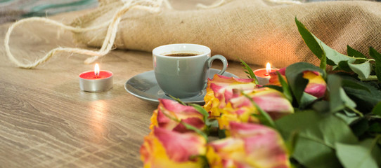 Obraz na płótnie Canvas Fresh italian style coffee next to flower bouquet