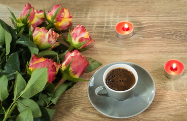 Fresh italian style coffee next to flower bouquet