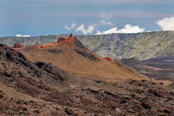 Cones of Cratere Rivals at southern slope of volcano Piton de la Fournaise at island La Reunion