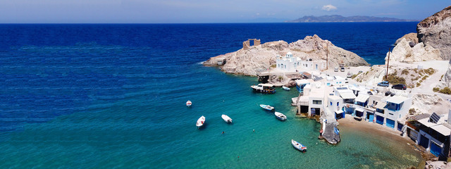 Fototapeta na wymiar Aerial drone ultra wide photo of famous fishing seaside village of Firopotamos with traditional Cycladic character, Milos island, Cyclades, Greece