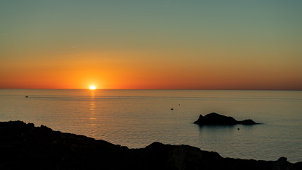 Sunrise from the Cap de Creus lighthouse in the Mediterranean Sea