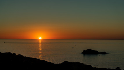 Sunrise from the Cap de Creus lighthouse in the Mediterranean Sea