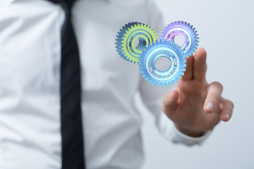Business, Internet and technology concept. Business select gear icon on virtual screen.