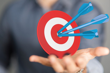 dart target arrow hitting on bullseye which is the ultimate goal that everyone wants.