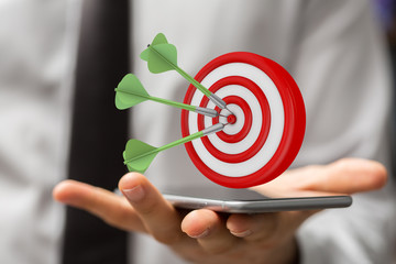 Dart arrow on target dartboard, Business success concept..
