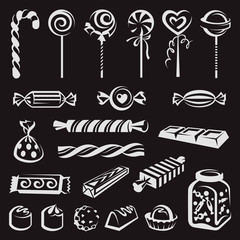 collection with various candies isolated on black background
