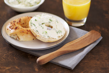 bagel with cream cheese and orange juice