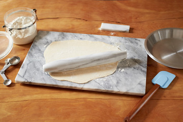 pastry dough with marble rolling pin