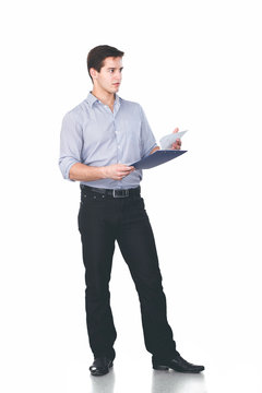 Young Man Standing With Folder, Isolated On White Background