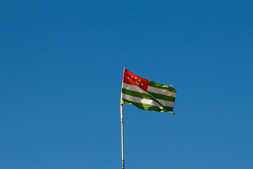 National flag of Abkhazia against the sky