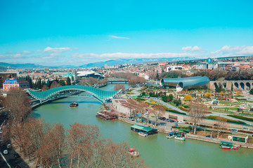 Tbilisi city panorama. Old city, new Summer Rike park, river Kura, the European Square and the Bridge of Peace