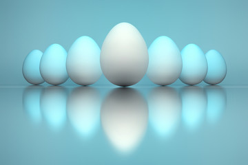 White Easter eggs standing in a row over reflective surface on blue background