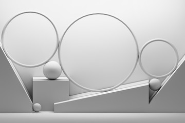 Black and white abstract composition with geometric primitive shapes circles, spheres and blocks