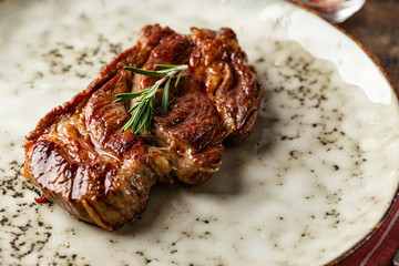 Two beef steak on dark gray background