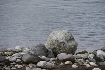 Stones on the riverbed / Background material of the natural scene.