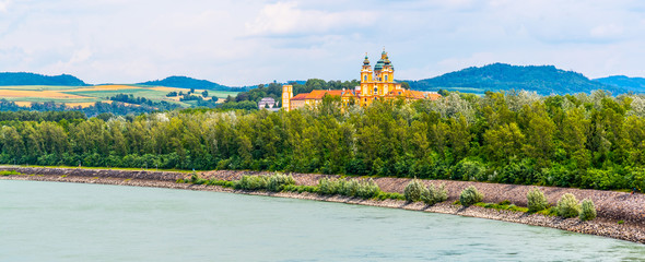Panoramic view of Melk Abbey, German: Stift Melk, from Danube River. Austria.