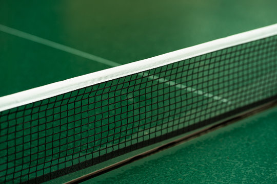 Table Tennis Or Ping Pong Rackets And Balls On Table. Sport Concept.Texture Of Green Wooden Table,equipment For Table Tennis Sport