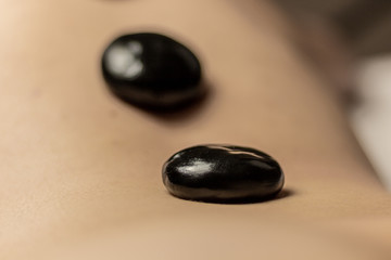 massage chinois pierre chaude noir