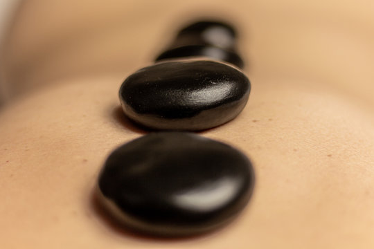 massage chinois pierre chaude noir