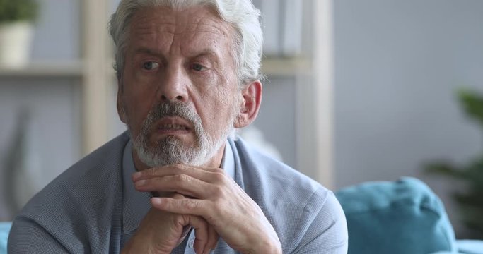 Worried older mature man suffering from depression.