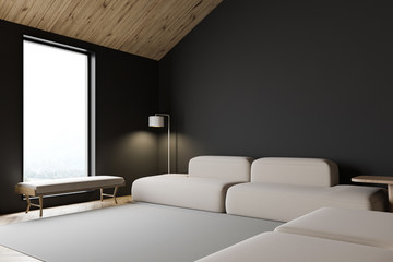 Grey attic living room corner with sofa