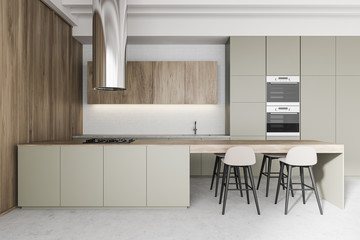 White and wooden kitchen interior with bar