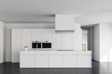White kitchen interior with island
