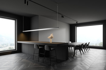 Gray kitchen corner with bar and table