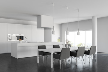 White kitchen corner with dining table