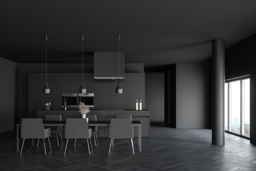 Gray kitchen with table and island
