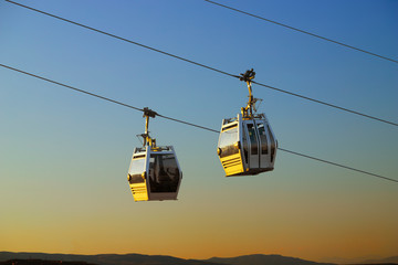 Funicular (rope way) over the Tbilisi city at sunset. Georgia