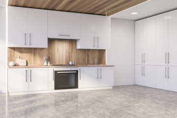Wooden kitchen corner with white countertops