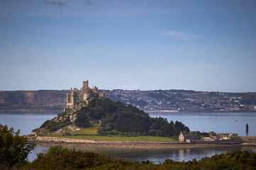 Elevated view of St Micheals Mount in Marazion, Penzance in Cornwall. Historic Castle with moat on Seaside Town in England