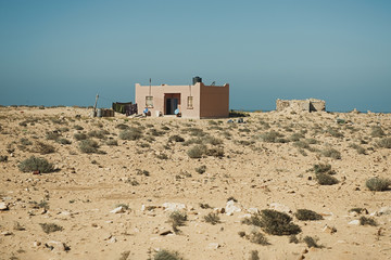 a dwelling next to the road at the atlanic coast of Morocco