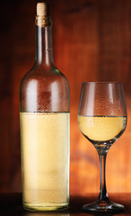 incomplete wine bottle with goblet