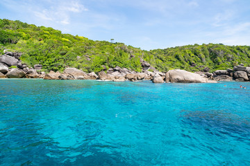 Beautiful tropical island with sea water surface in summer season.