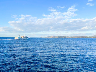 Fototapeta premium Japan blue sky and sea and tourist boat.