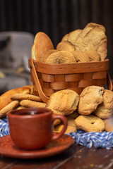 Cup of coffee with traditional Nicaraguan bread in a basket