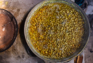 Corn Nixtamal to make tortillas cooked in an aluminum container
