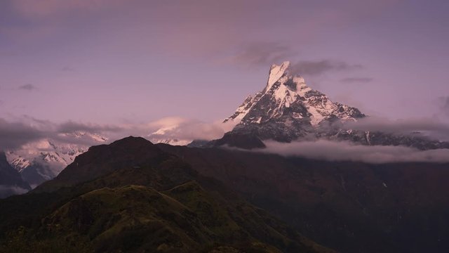 Time lapse of Machapuchare peak at sunset, Mardi Himal trek, Annapurna range in Pokhara, Nepal, Asia