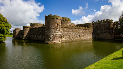 Fototapeta na wymiar Beaumaris Castle surrounded by a moat