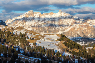 Autumn Dolomites panorama photo, sunset Trentino Alto Adige mountain pass, Italy