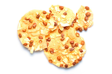 Top view of Thai snack-fried peanut with wild yam on the isolated white background