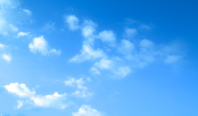Naklejka na ściany i meble ิblue sky against white floating clouds background