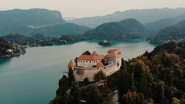 Aerial view of Lake Bled and the castle of Bled, Slovenia, Europe. Aerial drone video footage.