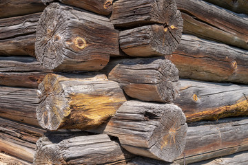 Close up of old weathered wooden logs