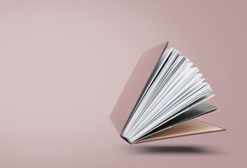 Large hardcover book with open pages