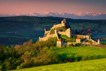 Picturesque medieval Rupea fortress at sunrise, Brasov region, Transylvania, Romania