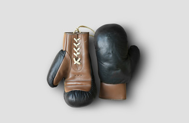 Vintage leather Boxing gloves are on the table